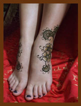 floral henna tattoos on feet